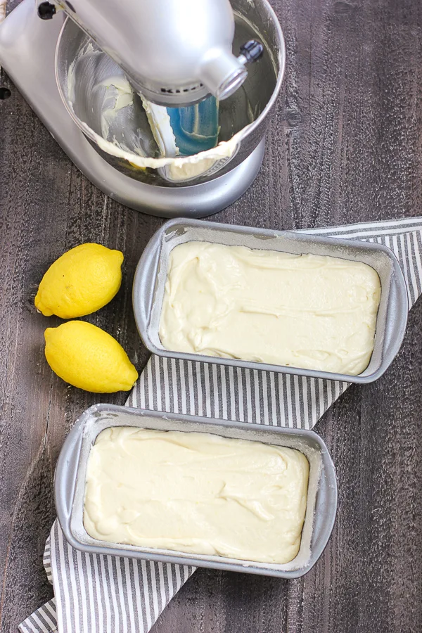 Glazed lemon pound cake batter in loaf pans before baking