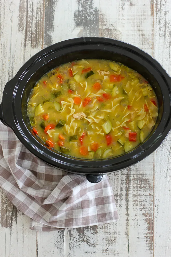 Photo of finished turkey noodle soup in the slow cooker