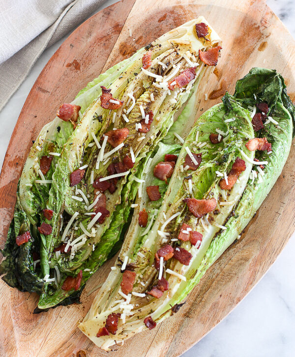 Grilled Romaine with Fig Vinaigrette on a wooden serving board