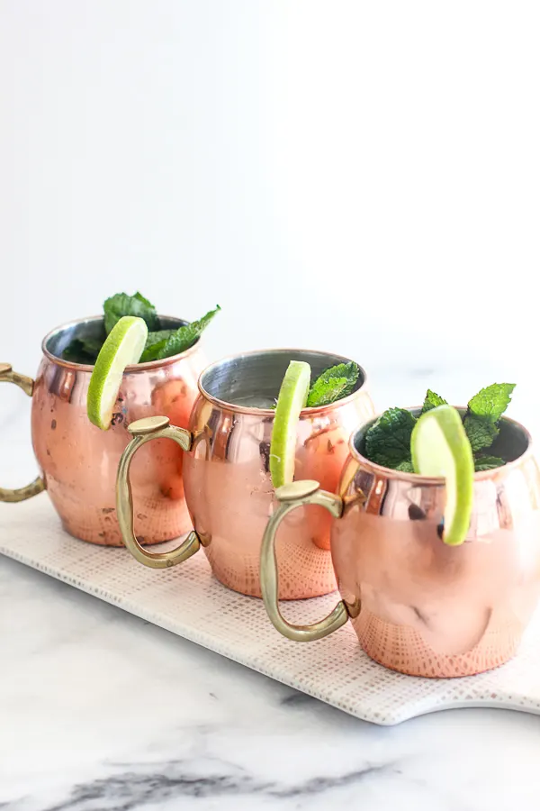 Three bourbon mules ready to serve