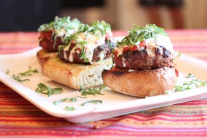 grilled italian meatloaf burgers on a plate