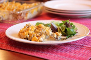 side picture of plate of cheeseburger Mac with salad