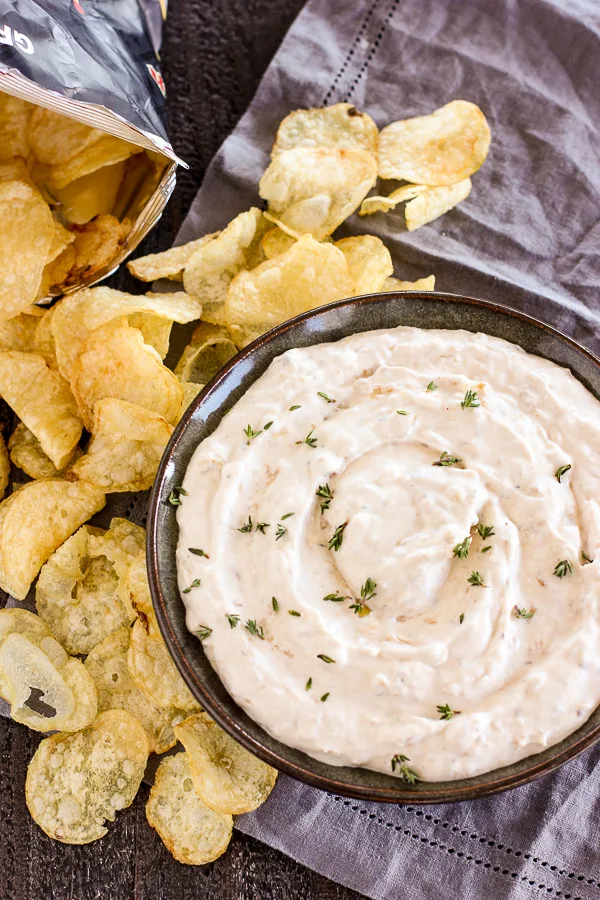 French onion dip in served with kettle chips for dipping