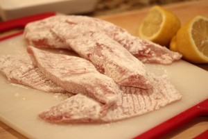 fish fillets after coating with flour