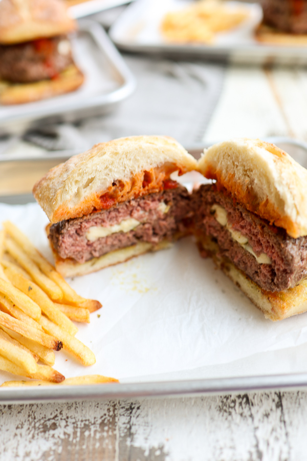 Finished juicy lucy cut in have to show the cheesy filling.