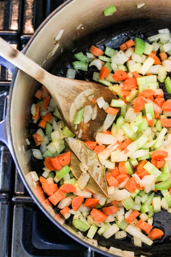 Sautéing vegetables in the soup pot for Osso Buco Soup