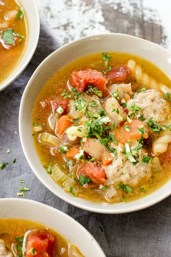 Close up overhead shot of Osso Buco Soup in a serving bowl