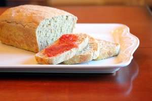 Sliced english muffin bread with strawberry jam