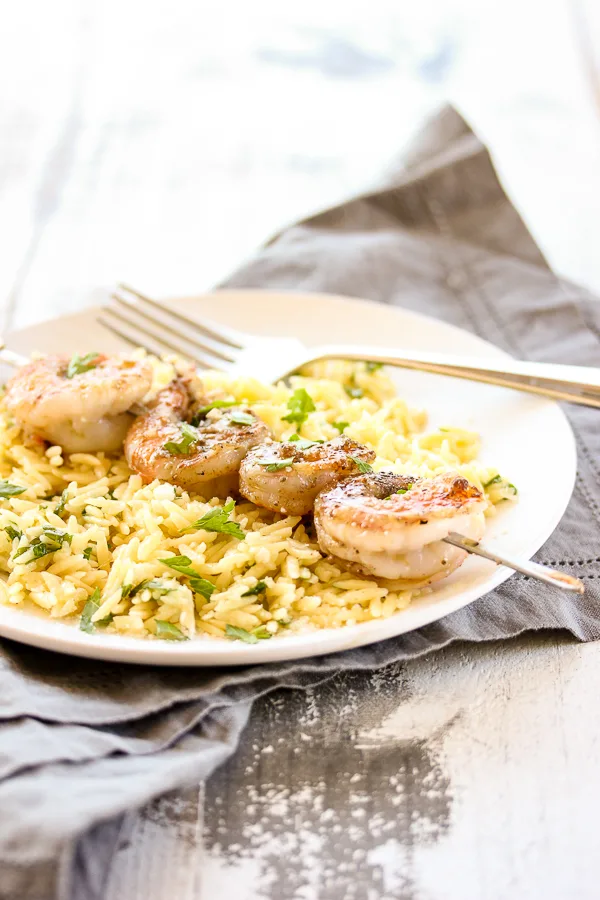 Another view of the plated shrimp and orzo