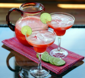 margaritas served with a lime garnish