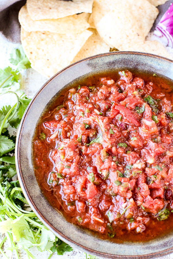 Overhead of finished salsa served with tortilla chips