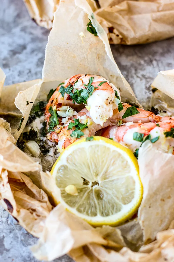 Shrimp scampi in the parchment paper after baking, before plating