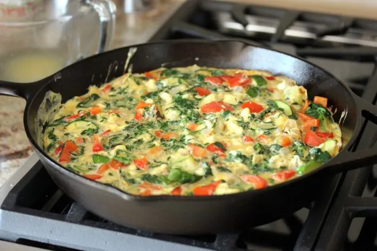 Finished veggie frittata in the skillet on the stove top