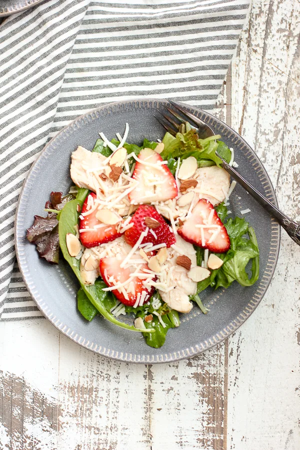 Overhead photo of plated chicken strawberry salad