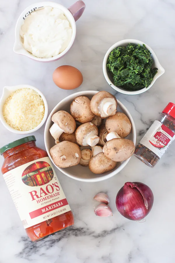 Ingredients needed to make spinach and ricotta stuffed mushrooms