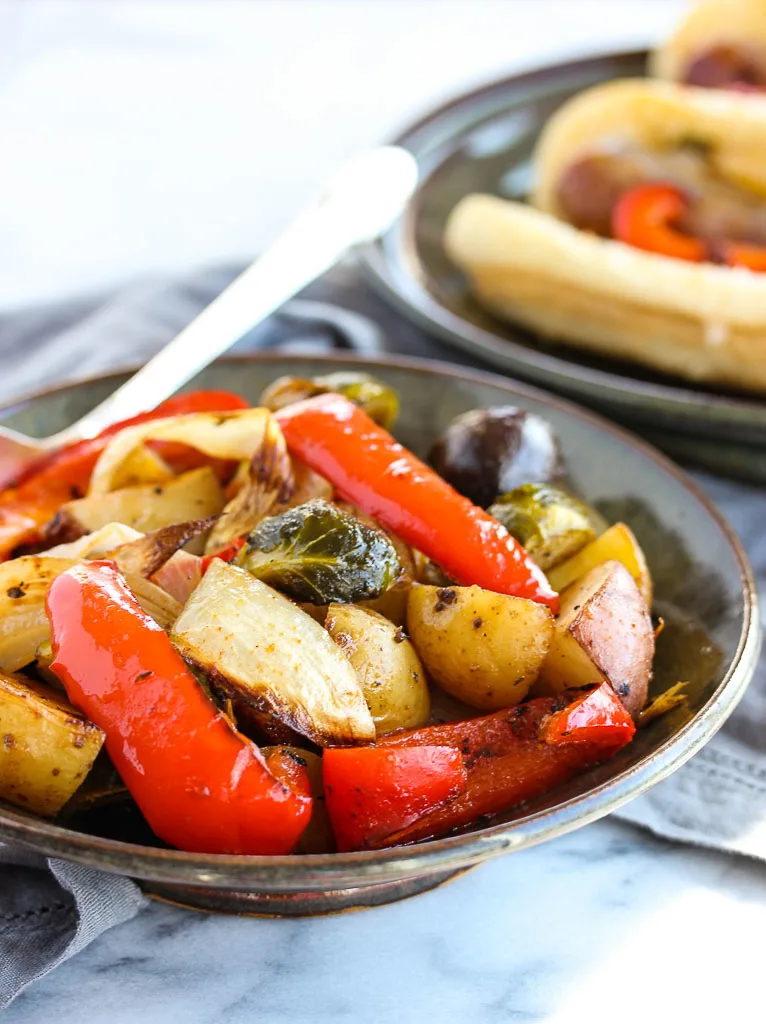 Showing the roasted veggies in a serving bowl after roasting