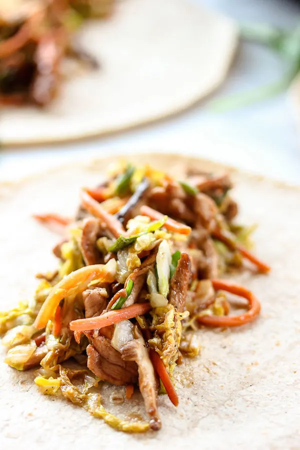 Ready in just 30 minutes, mu shu pork wraps are a flavorful meal that's perfect for busy weeknights. | lisasdinnertimedish.com