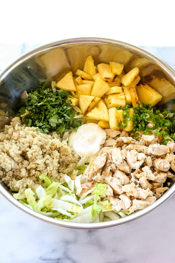 Grilled pineapple, chicken and quinoa salad is a a healthy, summery salad loaded with protein and lots of sweet and savory flavor, as well as a deliciously creamy yogurt dressing. | lisasdinnertimedish.com