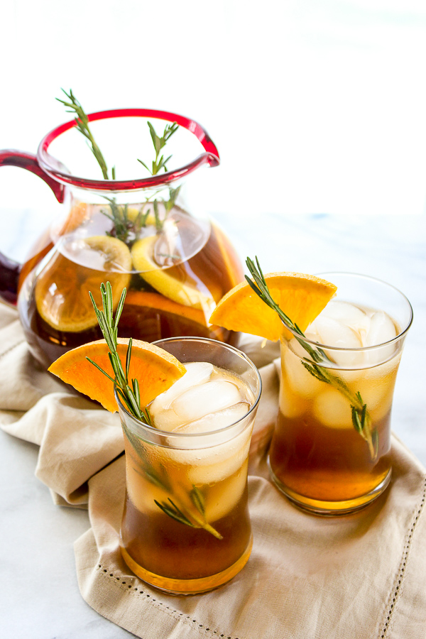 Rosemary orange ice tea has a light, slightly sweet flavor from the citrus with just a hint of rosemary in the background. | lisasdinnertimedish.com