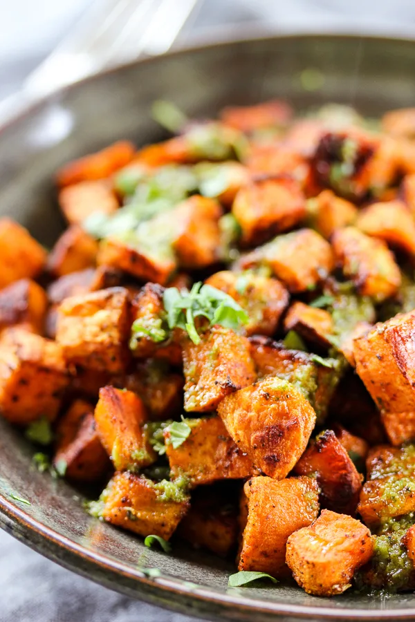 A zesty spice mix, along with a spicy jalapeño lime vinaigrette give these Tex-Mex roasted sweet potatoes incredible flavor and a perfect balance of sweet and spicy. | lisasdinnertimedish.com