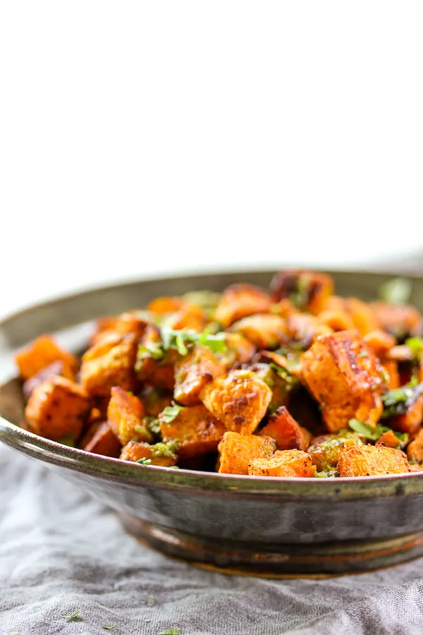 A zesty spice mix, along with a spicy jalapeño lime vinaigrette give these Tex-Mex roasted sweet potatoes incredible flavor and a perfect balance of sweet and spicy. | lisasdinnertimedish.com