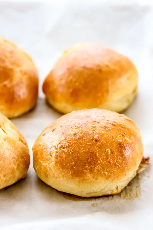 These Brioche hamburger buns are incredibly easy to make and they're deliciously light, tender and slightly sweet, perfect for topping with a juicy burger. | lisasdinnertimedish.com