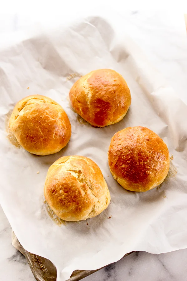 These Brioche hamburger buns are incredibly easy to make and they're deliciously light, tender and slightly sweet, perfect for topping with a juicy burger. | lisasdinnertimedish.com