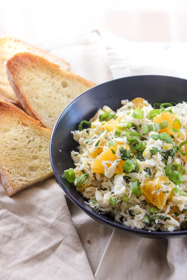 Citrus Crab Salad on Sourdough is a light, refreshing salad that's bursting with bright flavors. It's perfect for a light meal or served as an appetizer. | lisasdinnertimedish.com