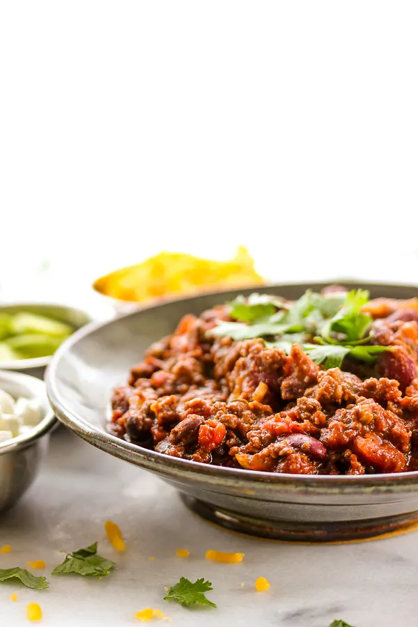 Winning game day chili is rich, hearty and full of healthy, good-for-you ingredients.  Serve it with all of your favorite toppings and it's perfect for any game day party. | lisasdinnertimedish.com