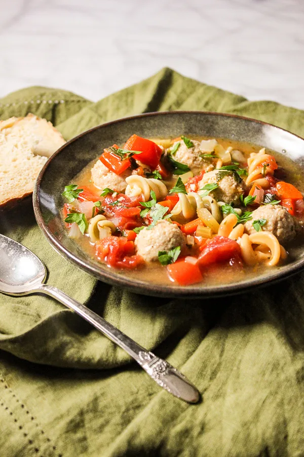 Italian Mini Chicken Meatball Soup is full of veggies and flavor with just a slight kick. It's also ready in 30 minutes, making it a perfect weeknight meal.
