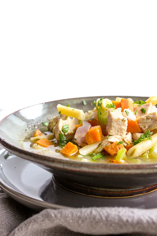 Close up of Homemade Weeknight Chicken Noodle Soup in a serving bowl