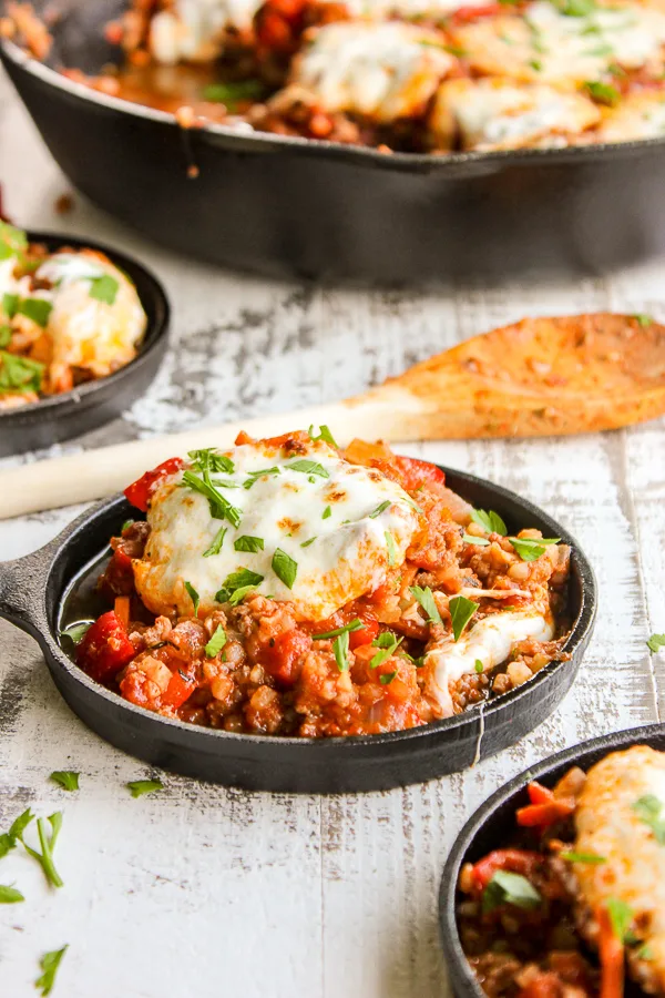 Italian stuffed pepper cauliflower rice skillet is a delicious twist on traditional stuffed peppers.  It's low carb, high protein and ready in 30 minutes, making it perfect for any night of the week.