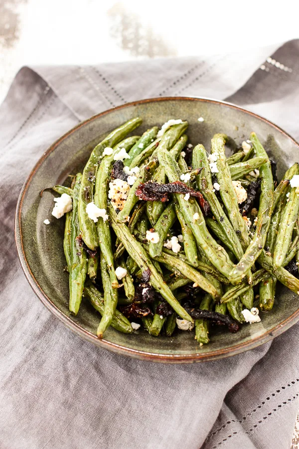 Roasted Sun Dried Tomato Green Beans with Goat Cheese