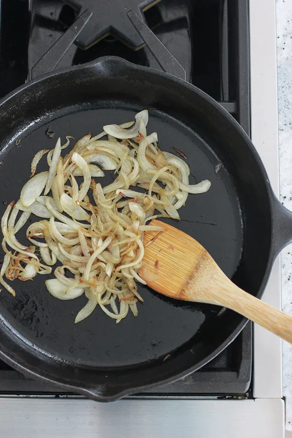 Onions sautéing in a skillet