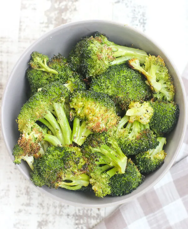 roasted broccoli in a serving bowl