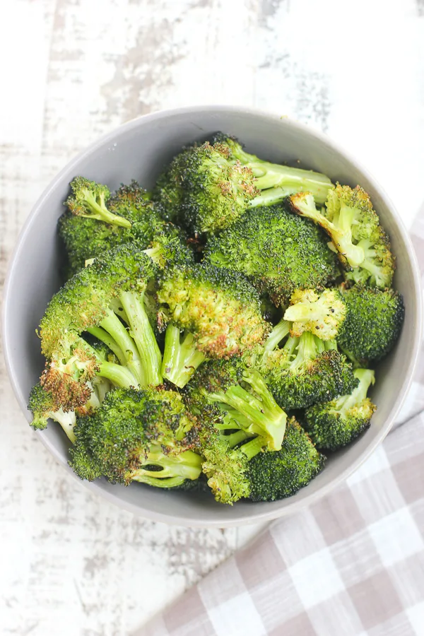 roasted broccoli in a serving bowl