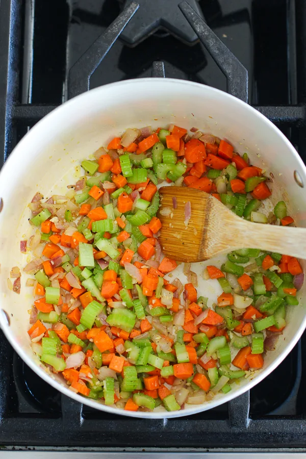 vegetables sautéing in the soup pot