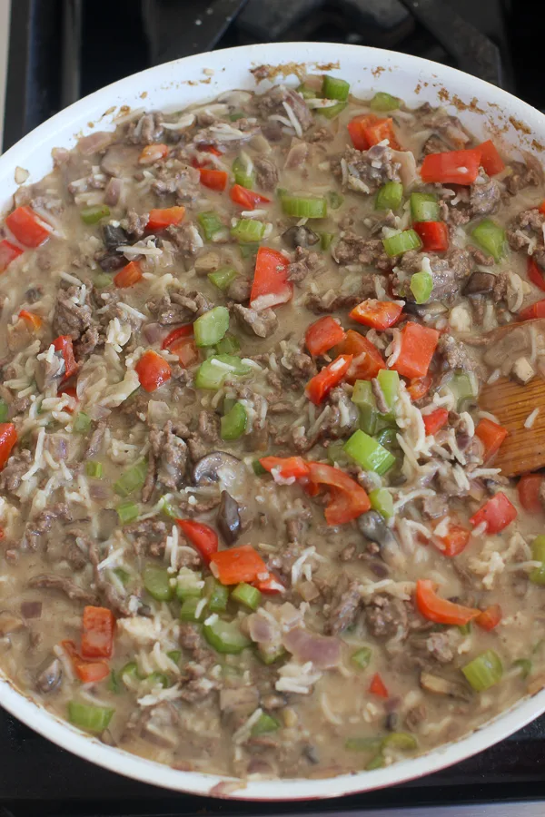 Showing the chow mein hot dish in the skillet right before transferring to the baking dish