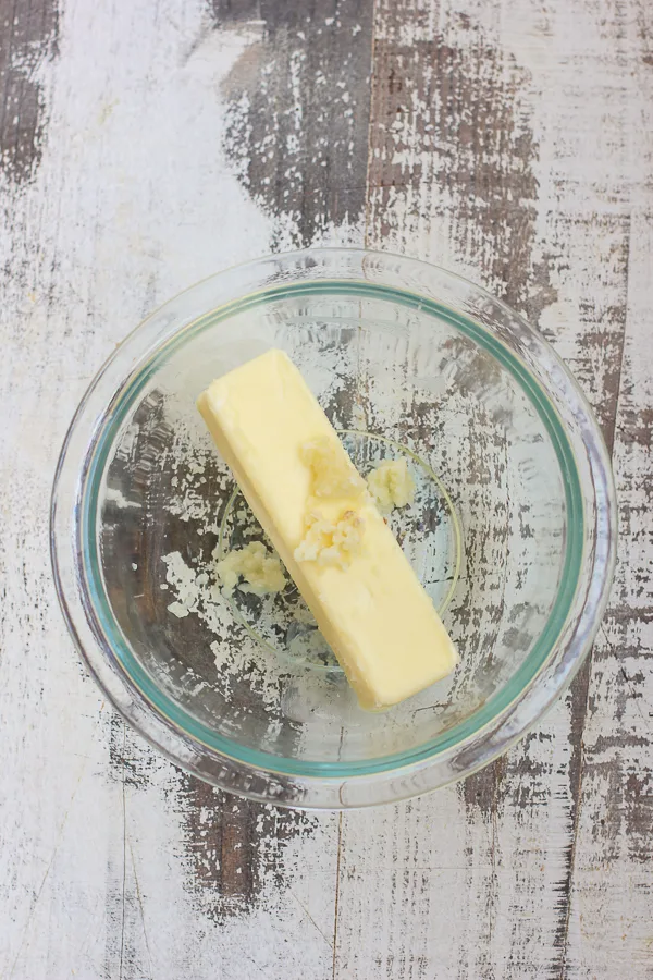 Adding the garlic to the butter before combining