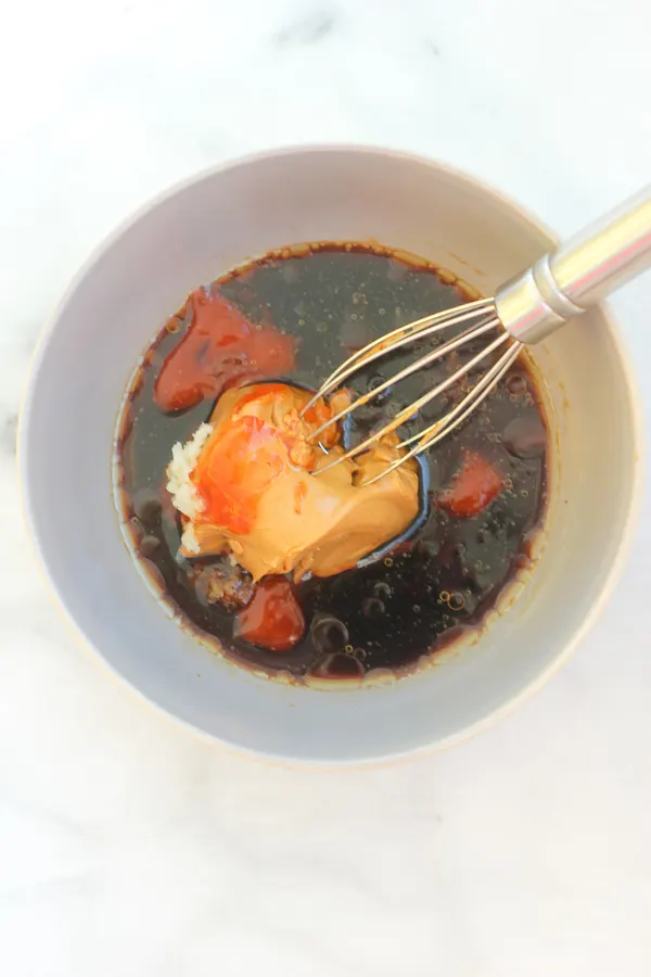 Initial ingredients in a mixing bowl before whisking together